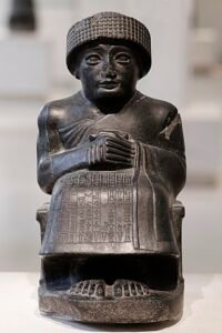 Gudea of Lagash, the Sumerian ruler who was famous for his numerous portrait sculptures that have been recovered.
